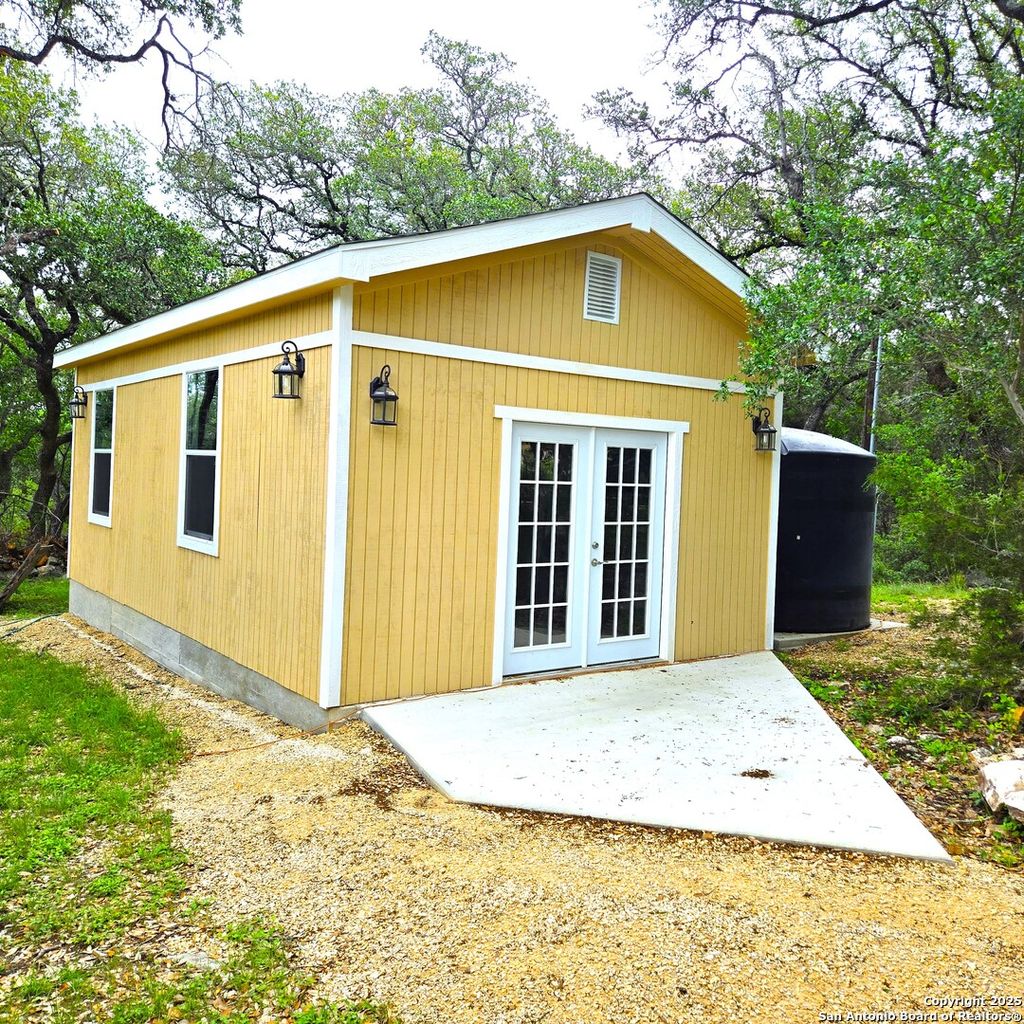Photo of 23007 S BREEZE ST, San Antonio, TX 78258 (MLS # 1926138)