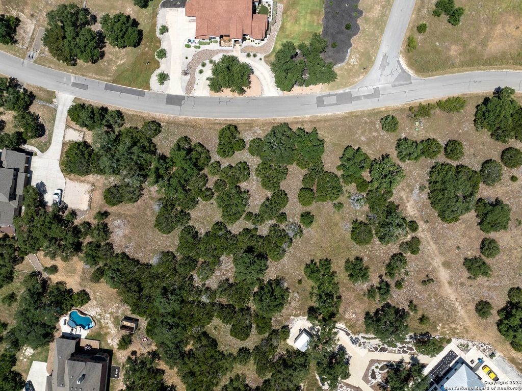 Photo of 7726 RAMBLE RIDGE, San Antonio, TX 78266 (MLS # 1803263)