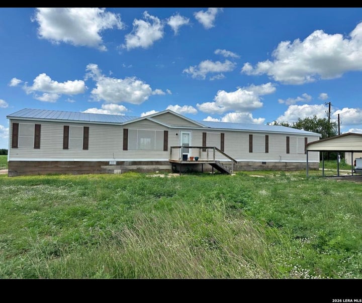 Photo 1 of 20 — 1667 COUNTY ROAD 345, Knippa, TX 78870