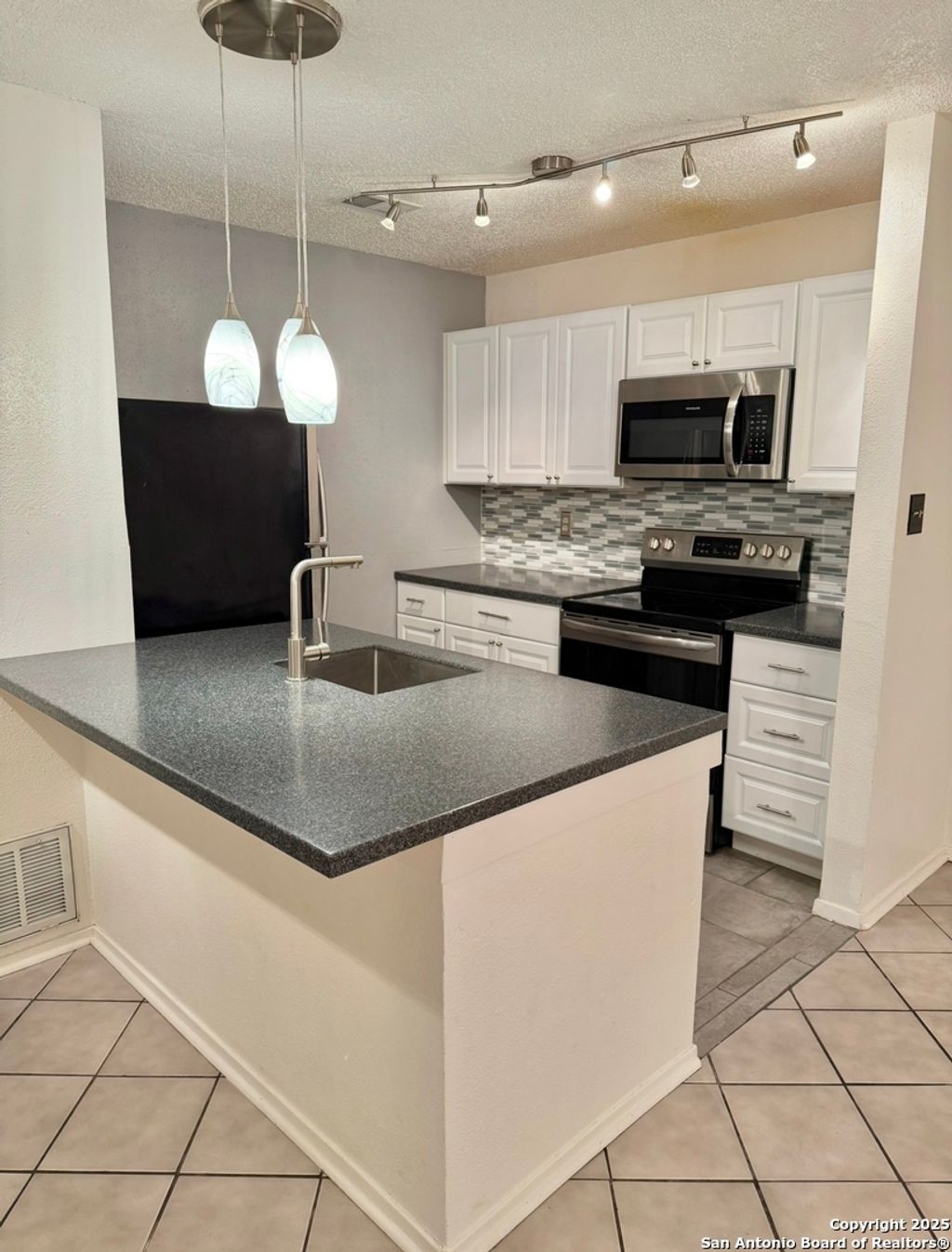 Photo of 10527 Perrin Beitel A107 #A107, San Antonio, TX 78217 (MLS # 1916534)