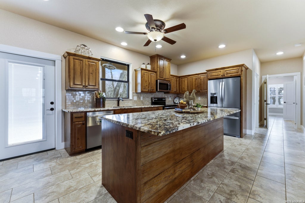 Photo of 203 UNIT B Champions Blvd (Two Homes), La Vernia, TX 78121 (MLS # 1955917)