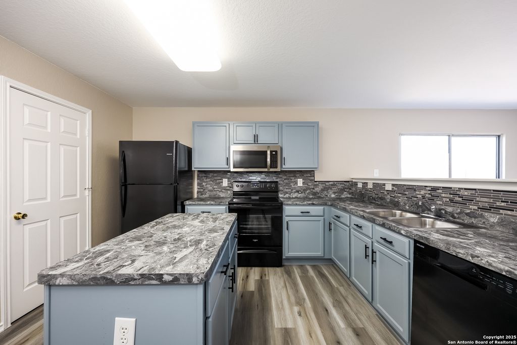 Photo of 9803 Amber Breeze, San Antonio, TX 78245 (MLS # 1894211)