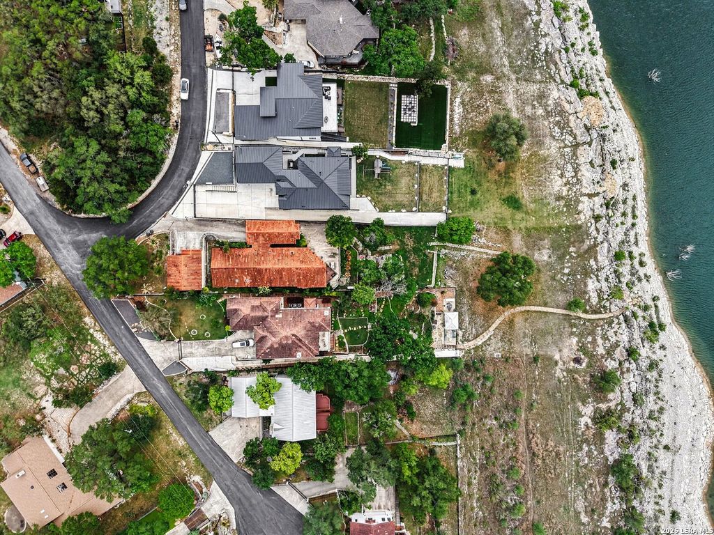 Photo of 1010 Village Shore Dr, Canyon Lake, TX 78133 (MLS # 1959873)