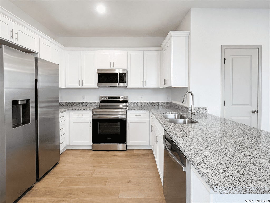 Photo of 10219 Tulipwood Run #101, San Antonio, TX 78252 (MLS # 2003560)
