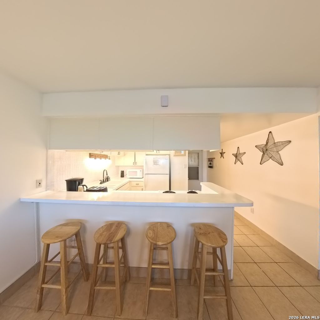 Photo of 15340 LEEWARD DR 203 #203, Corpus Christi, TX 78418 (MLS # 1959082)