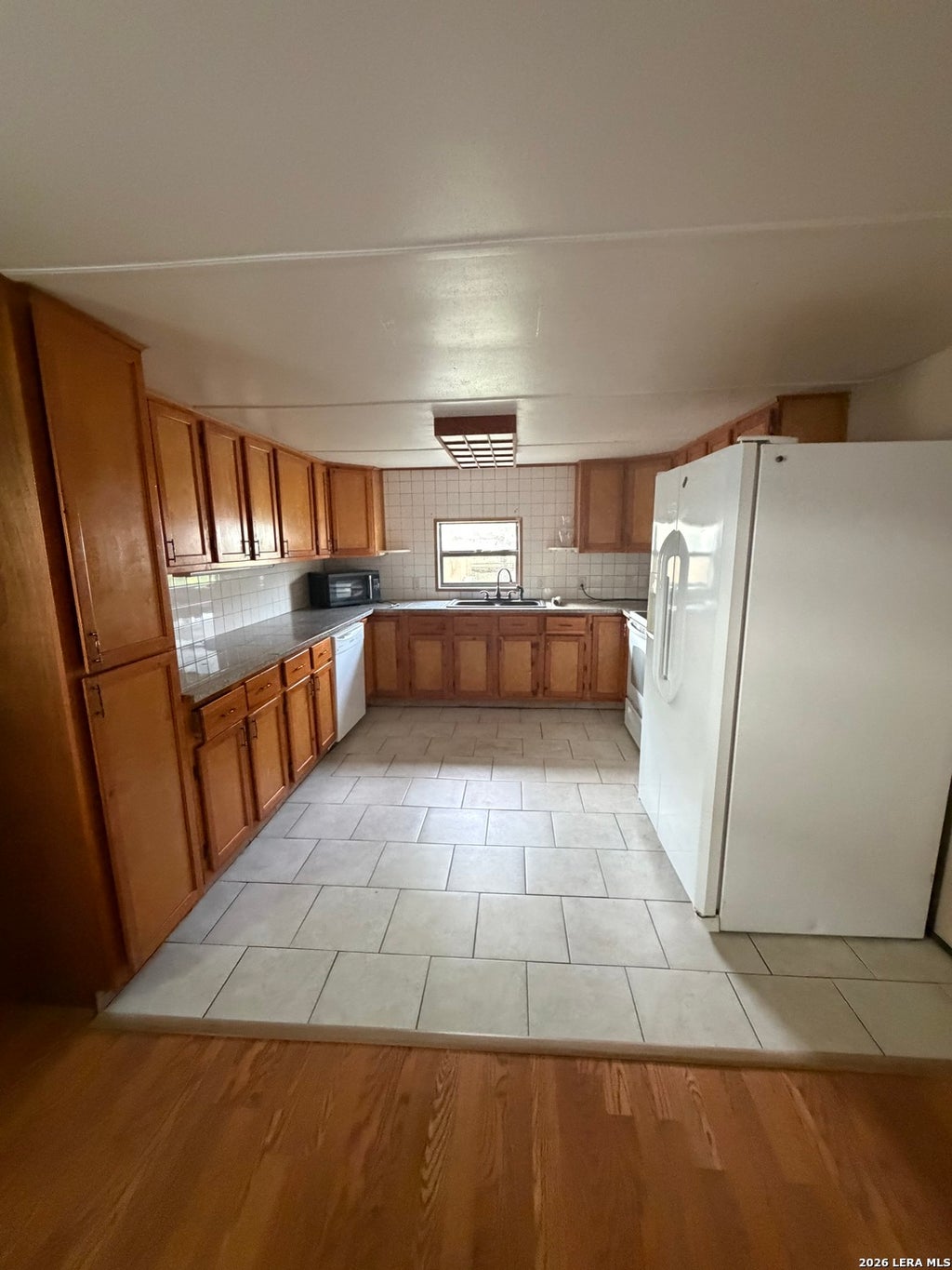 Photo of 12232 MADRONA ST, San Antonio, TX 78245 (MLS # 2006758)