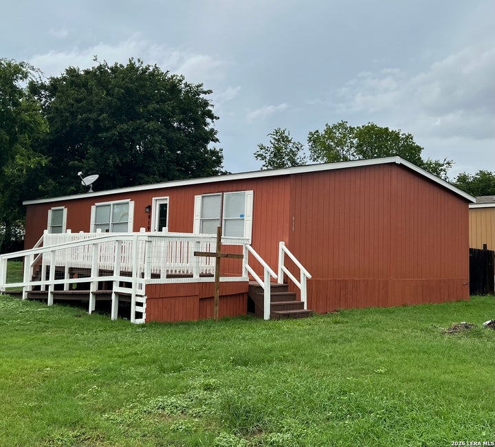 Photo 1 of 8 — 919 KAYROE RD, Adkins, TX 78101