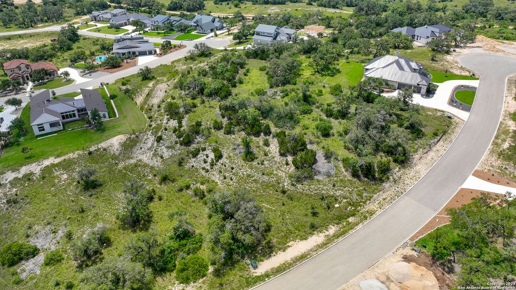 Photo of 23118 Tablerock Way, San Antonio, TX 78255 (MLS # 1703989)