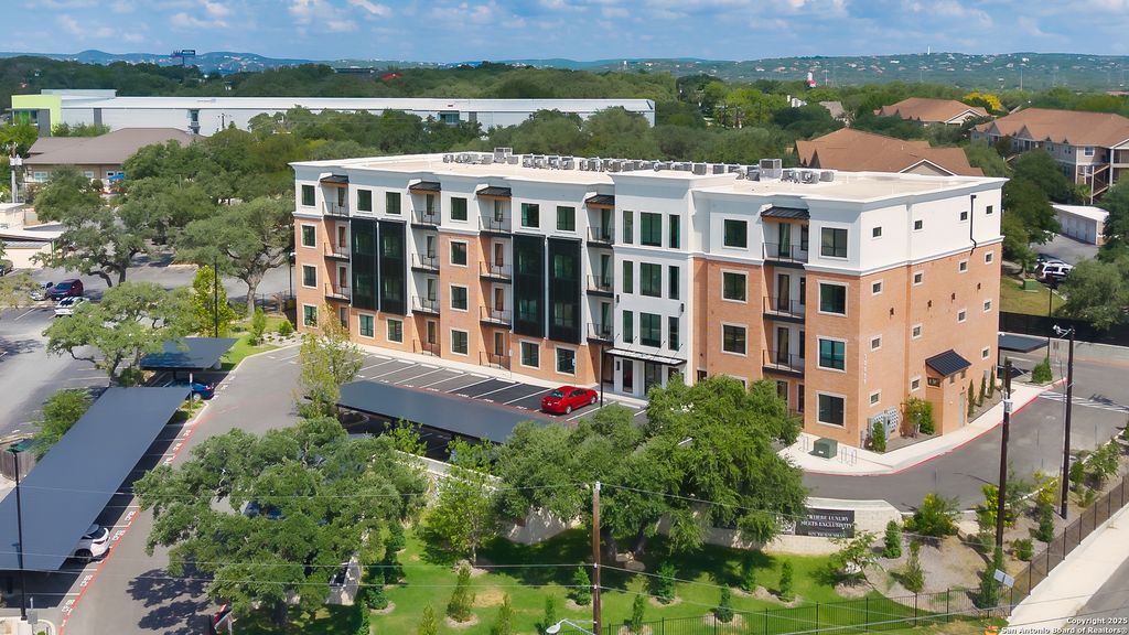 Photo of 10899 S Hausman 311 #311, San Antonio, TX 78250 (MLS # 1934272)