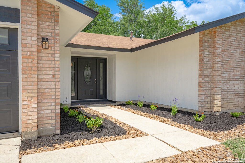 Photo of 6131 WINDBROOKE ST, San Antonio, TX 78249 (MLS # 1990935)