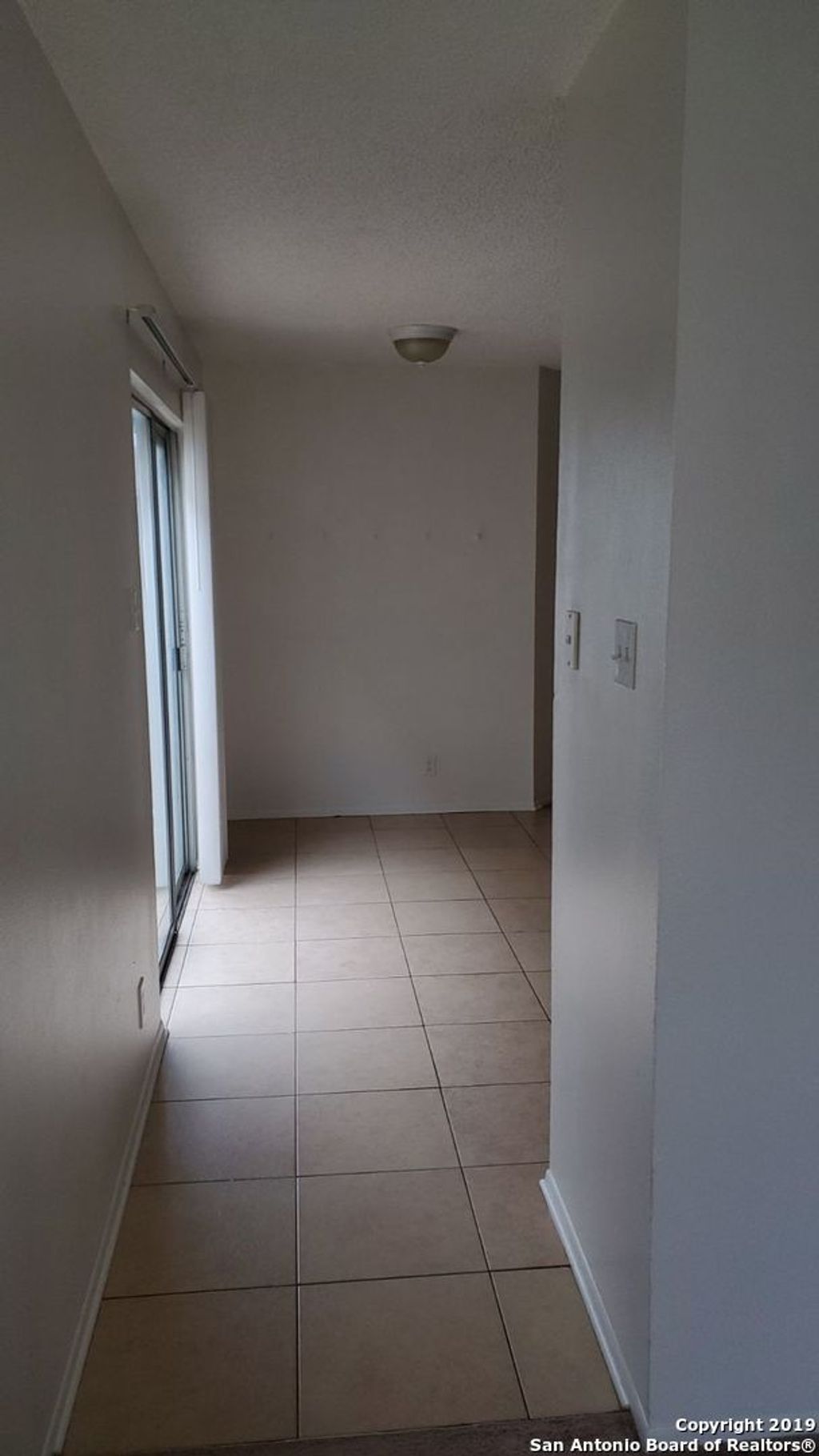 Photo of 7659 RIMHURST, San Antonio, TX 78250 (MLS # 1955955)