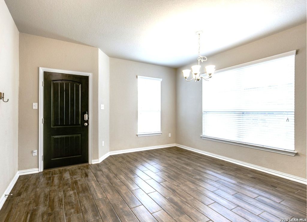 Photo of 7931 HEADWATERS TRL, San Antonio, TX 78254 (MLS # 1994067)