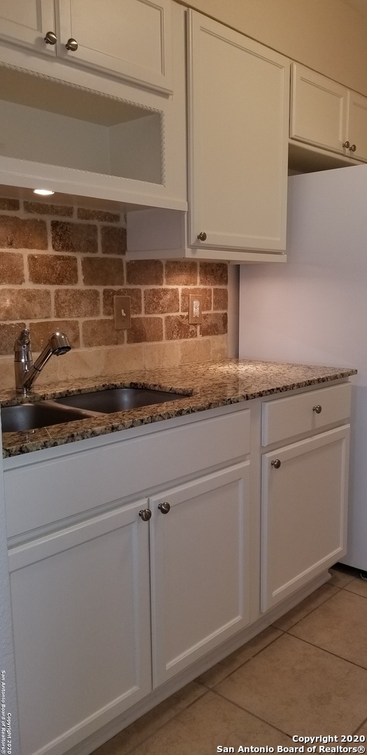 8702 VILLAGE DR 204