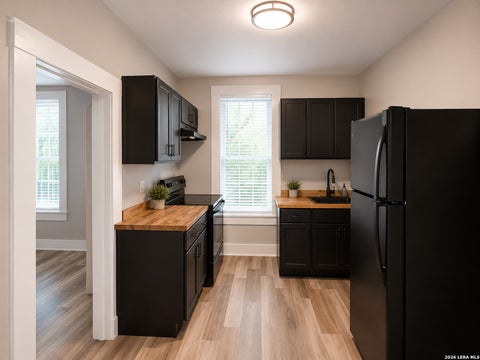 Photo of 215 S BRAZOS ST, San Antonio, TX 78207 (MLS # 1991636)