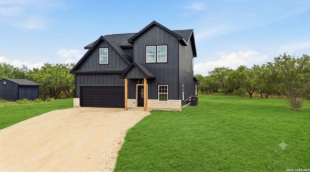 Photo of 111 County Road 2660, Devine, TX 78016 (MLS # 1990981)