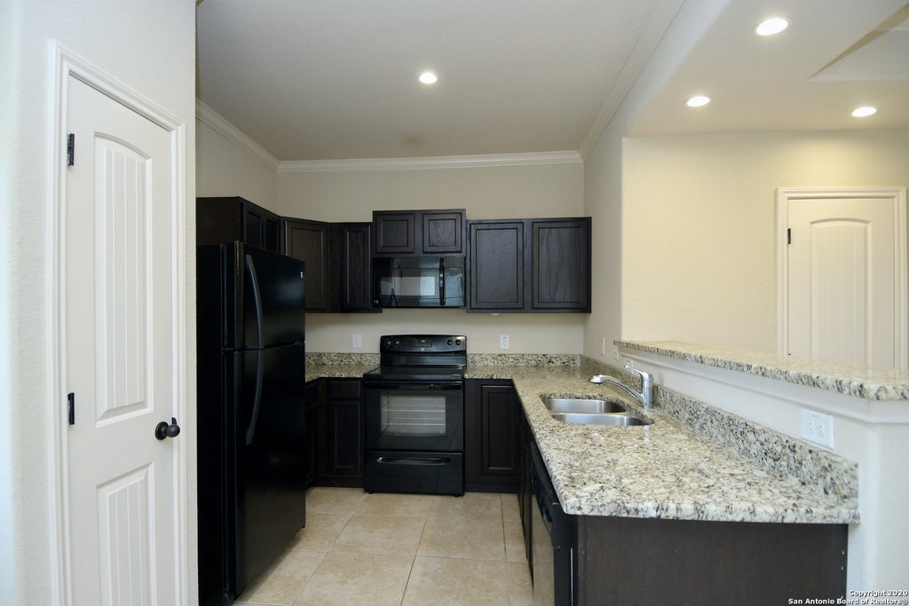 Photo of 6610 ARANCIONE AVE 102 #102, San Antonio, TX 78233 (MLS # 1991362)
