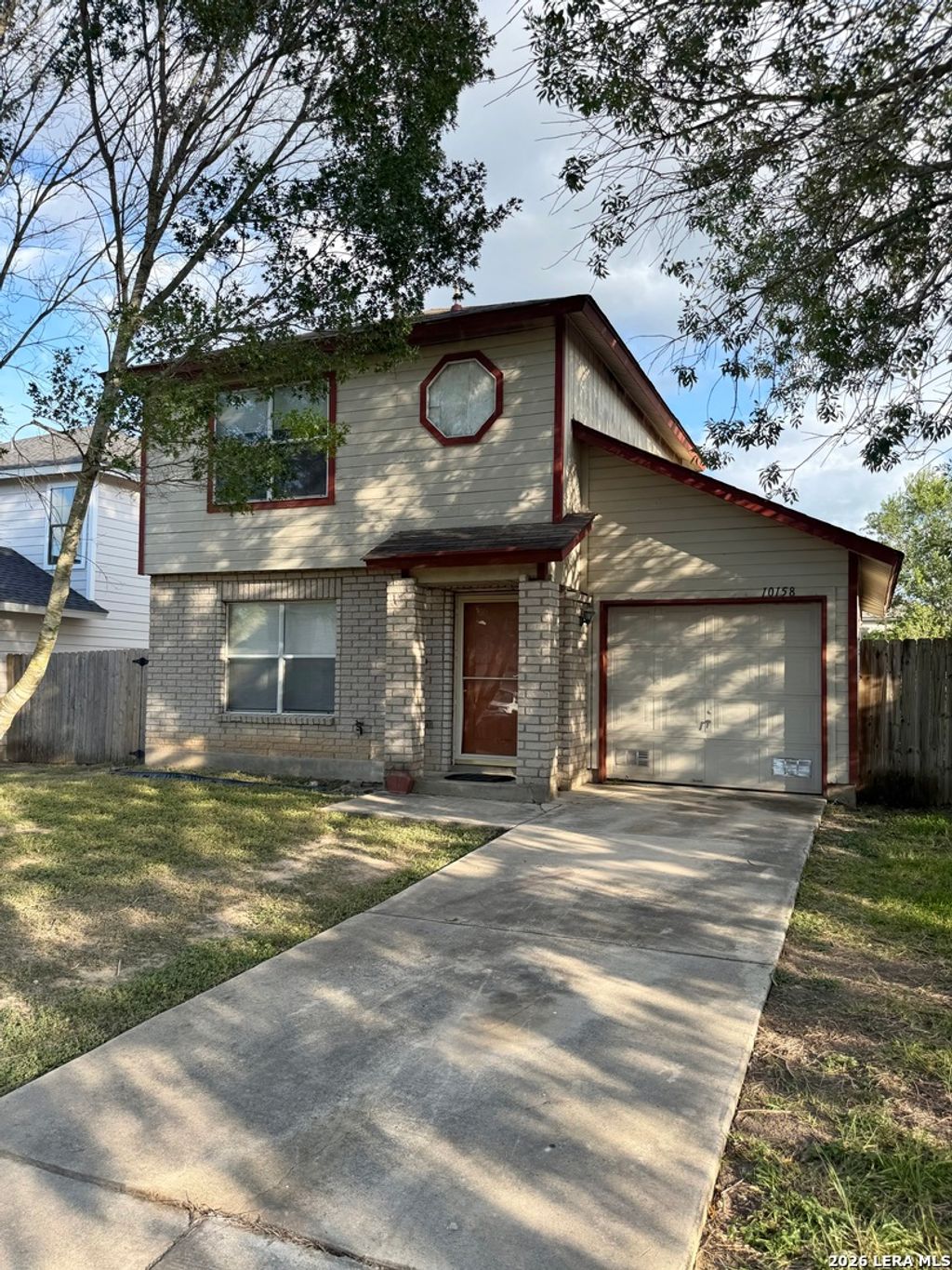 Photo of 10158 Bastrop Crk, San Antonio, TX 78245 (MLS # 2000351)