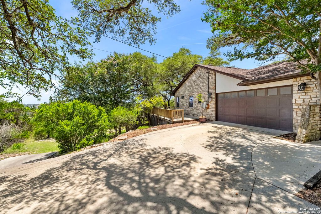Photo of 25615 Dull Knife Trl, San Antonio, TX 78255 (MLS # 1877309)