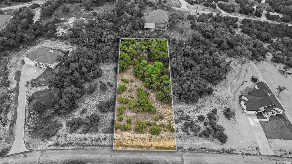Photo of 247 Prairie Tea Ln, Canyon Lake, TX 78133 (MLS # 1958109)