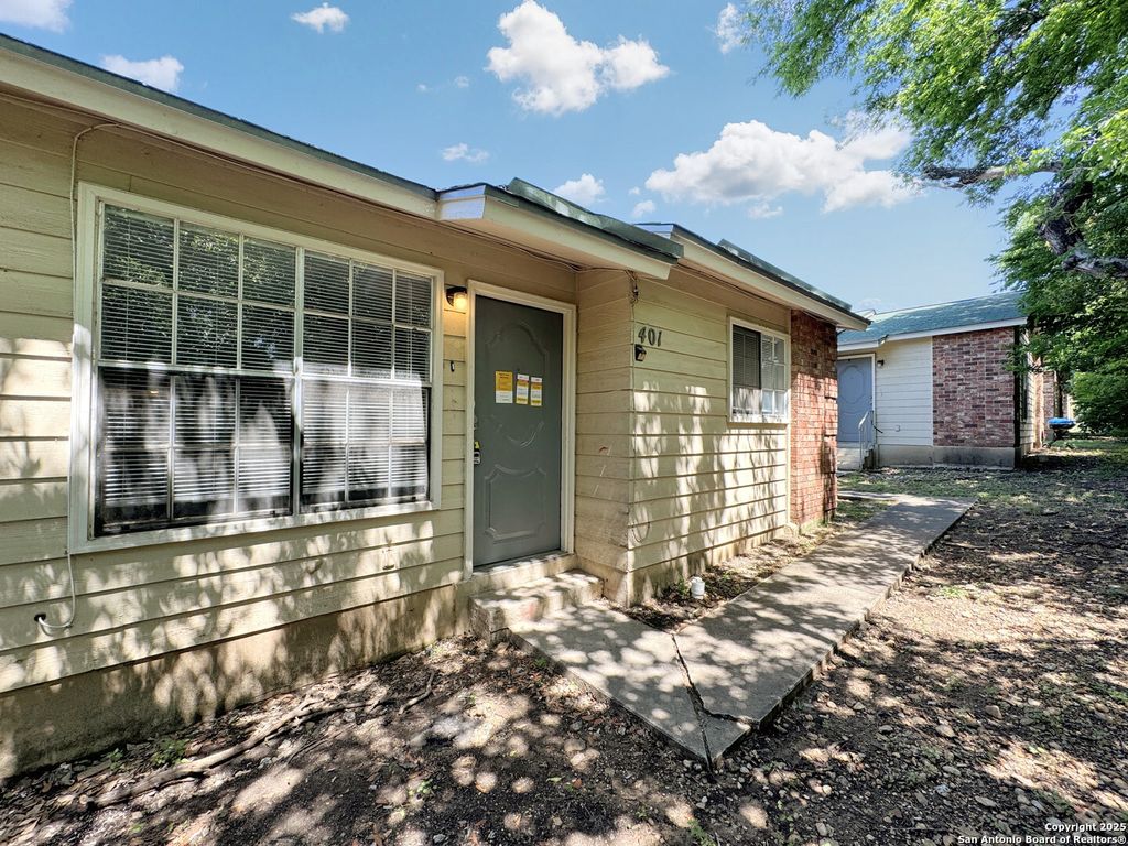 Photo of 844 E SUNSHINE DR 401 #401, San Antonio, TX 78228 (MLS # 1916386)