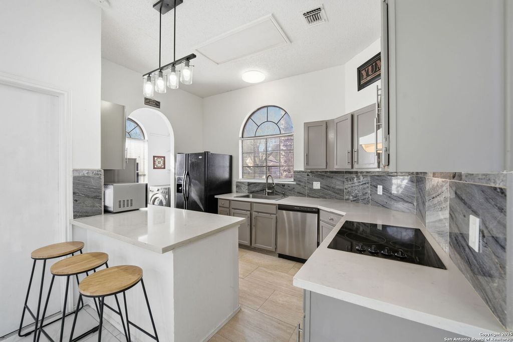 Photo of 6304 Village Arbor, San Antonio, TX 78250 (MLS # 1928113)