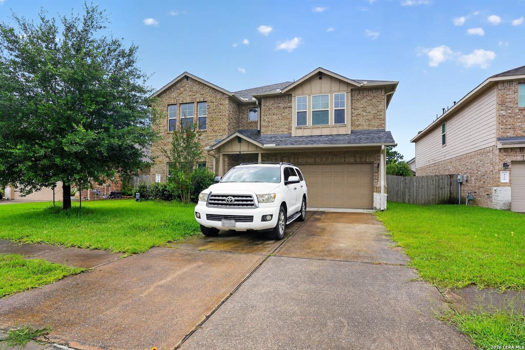Photo of 135 MEADOW VALLEY DR, Conroe, TX 77384 (MLS # 1993917)