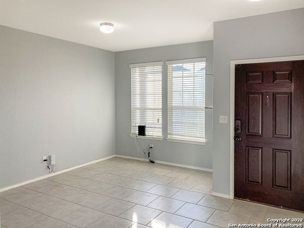 Photo of 9932 WADDIE LN, San Antonio, TX 78254 (MLS # 1939427)