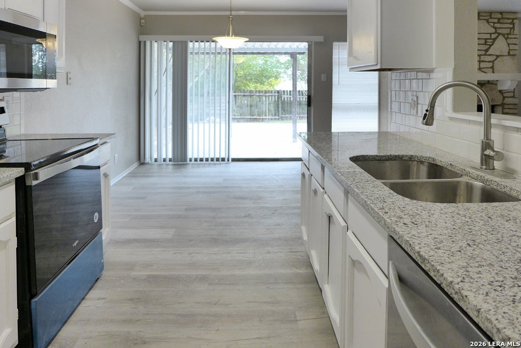 Photo of 10318 CONE HILL DR, San Antonio, TX 78245 (MLS # 1972961)