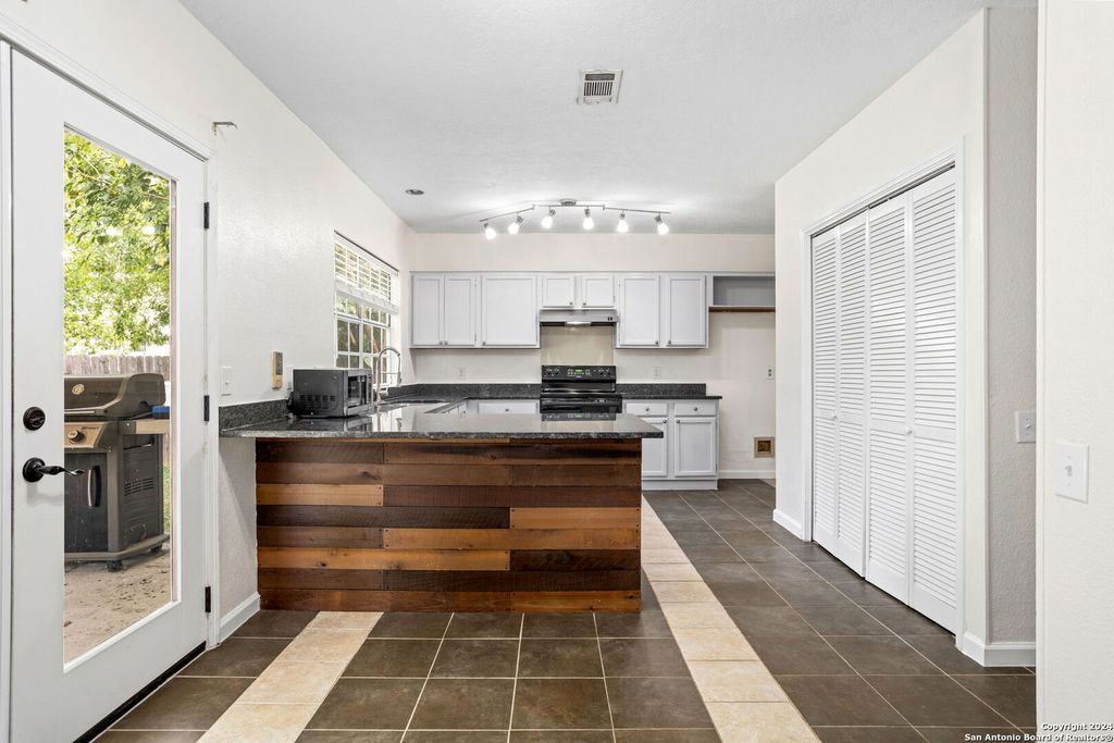 Photo of 9110 CHINON, San Antonio, TX 78250 (MLS # 1925924)