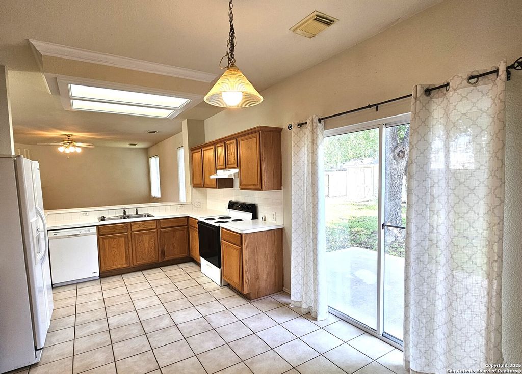 Photo of 237 TAPWOOD LN, Cibolo, TX 78108 (MLS # 1887609)