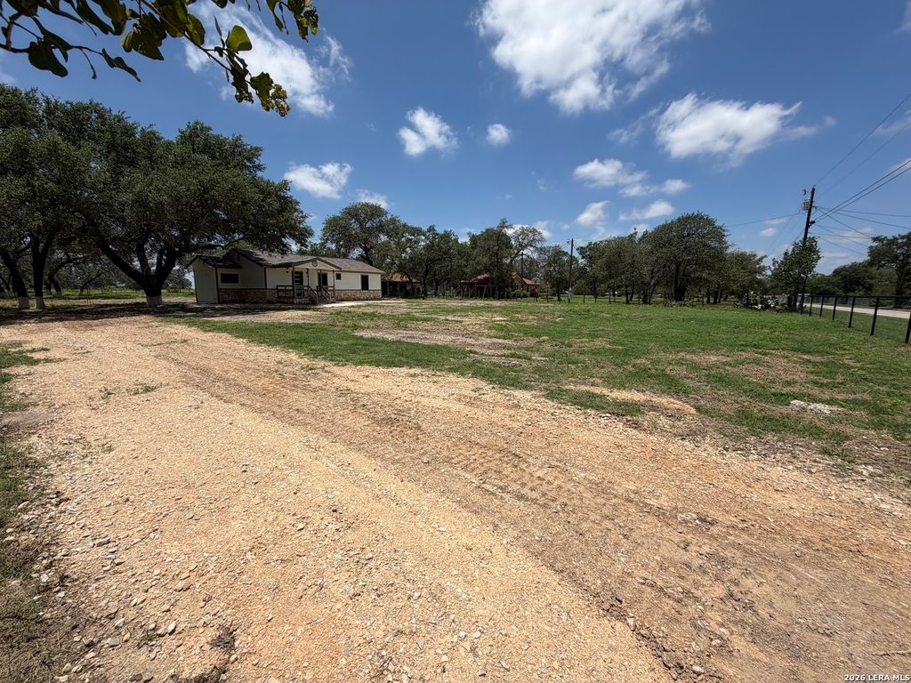 Photo of 505 NOTTINGHAM DR, Poteet, TX 78065 (MLS # 1971747)