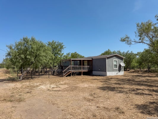2822 TOMBLIN RD, BIGFOOT, TX 78005 - Image d2a2fe1ff84d3d16705a9b48fe924329/3387503775