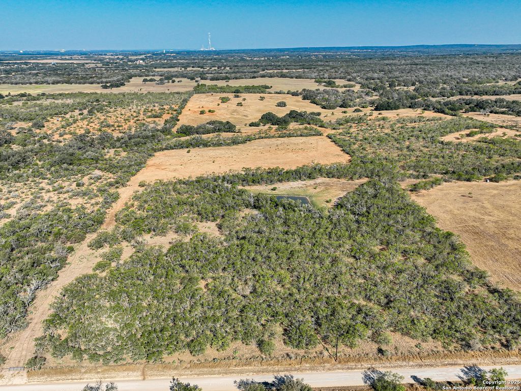 Photo of +/- 27.5 ACRES County Road 302, Floresville, TX 78114 (MLS # 1922226)