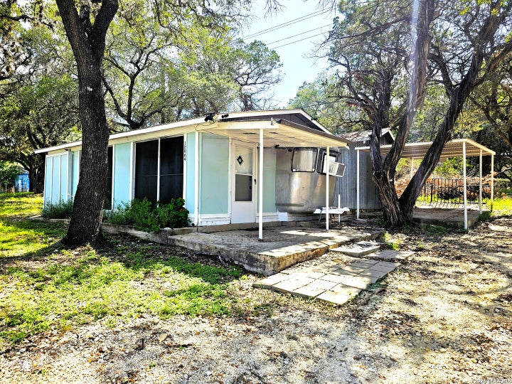 Photo 1 of 20 — 12064 Park Road 37, Lakehills, TX 78063