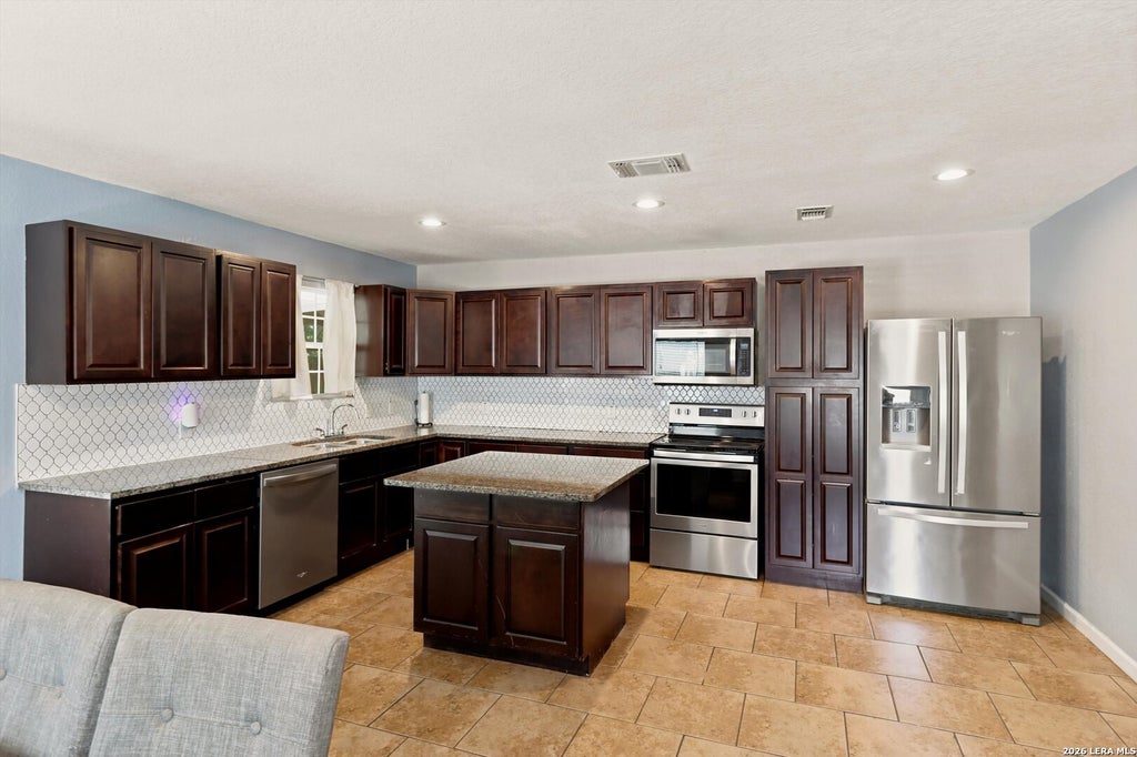 Photo of 1311 Rivas St, San Antonio, TX 78207 (MLS # 2002621)