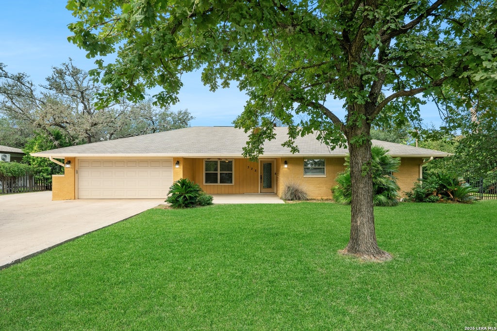 Photo of 325 MEADOWBROOK DR, Hollywood Park, TX 78232 (MLS # 2023585)