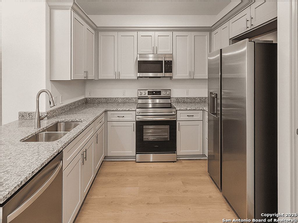 Photo of 7520 Briarwood Pass 102 #102, San Antonio, TX 78252 (MLS # 1914447)