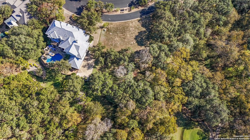 Photo of 60 ETON GREEN CIR, San Antonio, TX 78257 (MLS # 1826720)