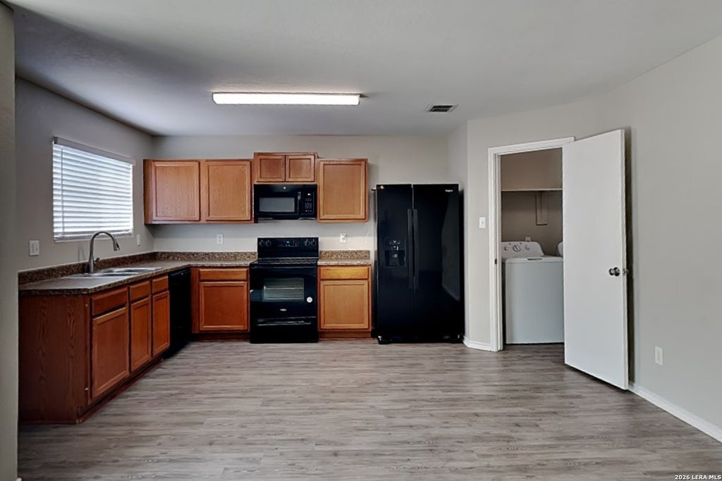 Photo of 9926 Amber Breeze, San Antonio, TX 78245 (MLS # 2018844)
