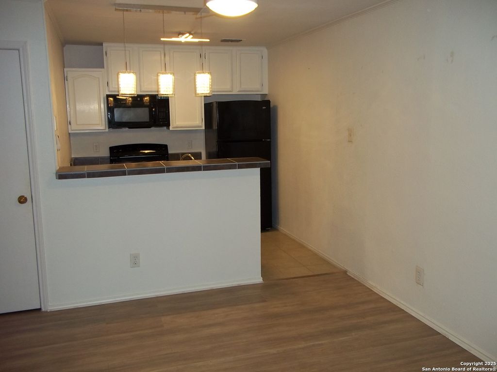 Photo of 4803 Hamilton Wolfe Rd 811 #811, San Antonio, TX 78229 (MLS # 1908230)