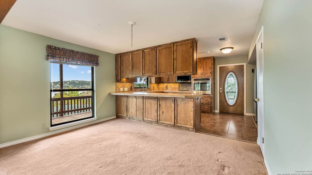 Photo of 642 Lakebreeze, Canyon Lake, TX 78133 (MLS # 1919869)