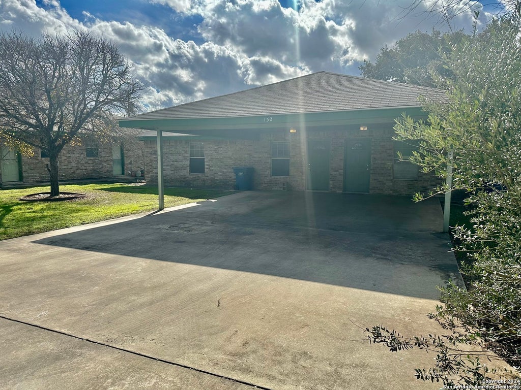 Photo of 132 S Mansfield St A #A, Pleasanton, TX 78064 (MLS # 1961846)