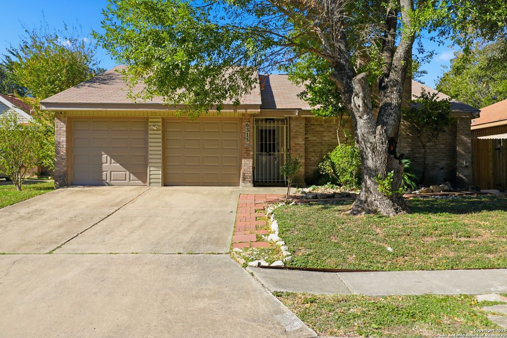 Photo of 6315 Forest Village, San Antonio, TX 78250 (MLS # 1924176)