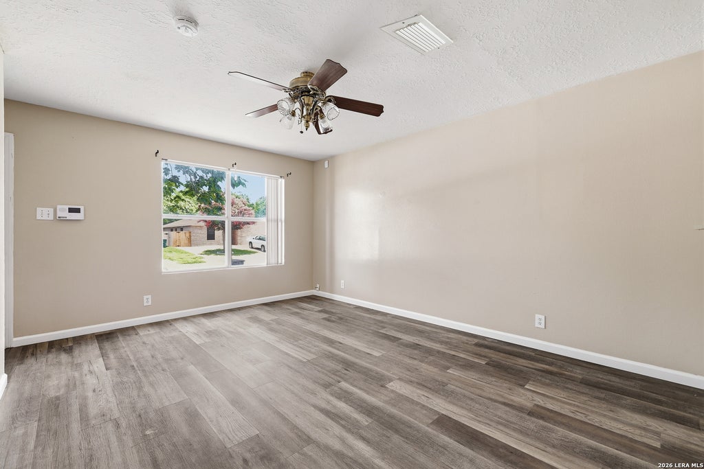 Photo of 9210 ENCINO VLG, San Antonio, TX 78250 (MLS # 1995588)