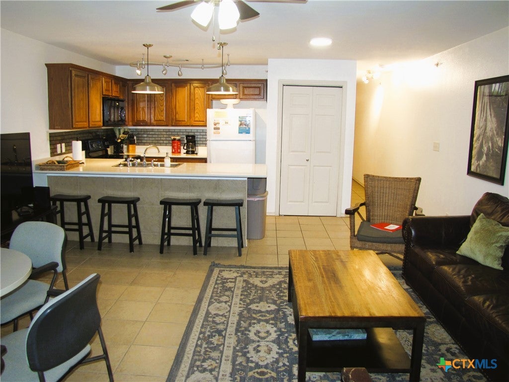Photo of 730 E Mather Street #J203, New Braunfels, TX 78130 (MLS # 614913)