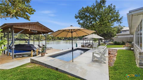 Photo of 210 Admiral Benbow Lane, McQueeney, TX 78123 (MLS # 622733)