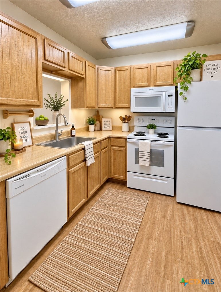 Photo of 1624 Aquarena Springs Drive #F147, San Marcos, TX 78666 (MLS # 623960)