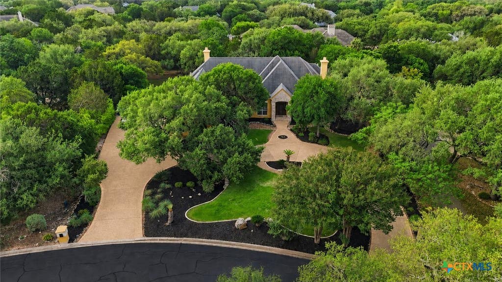 Photo of 9752 Trophy Oaks Drive, San Antonio, TX 78266 (MLS # 606441)