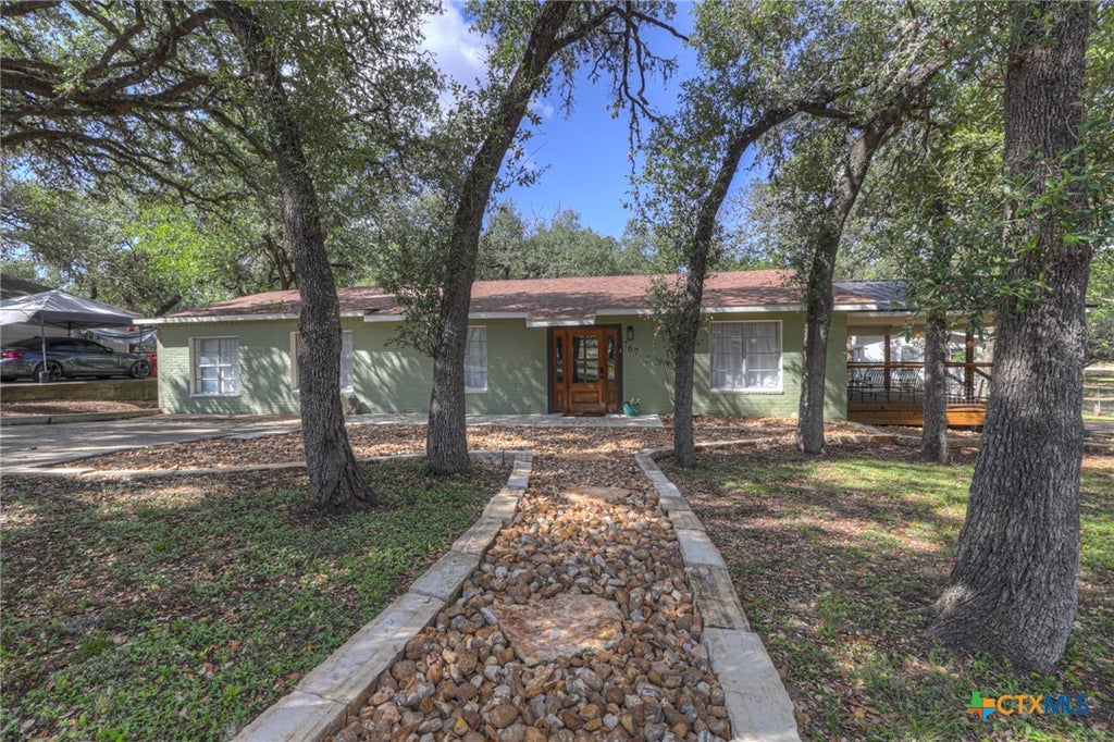 Photo of 767 Valley Oaks Drive, Canyon Lake, TX 78133 (MLS # 627083)