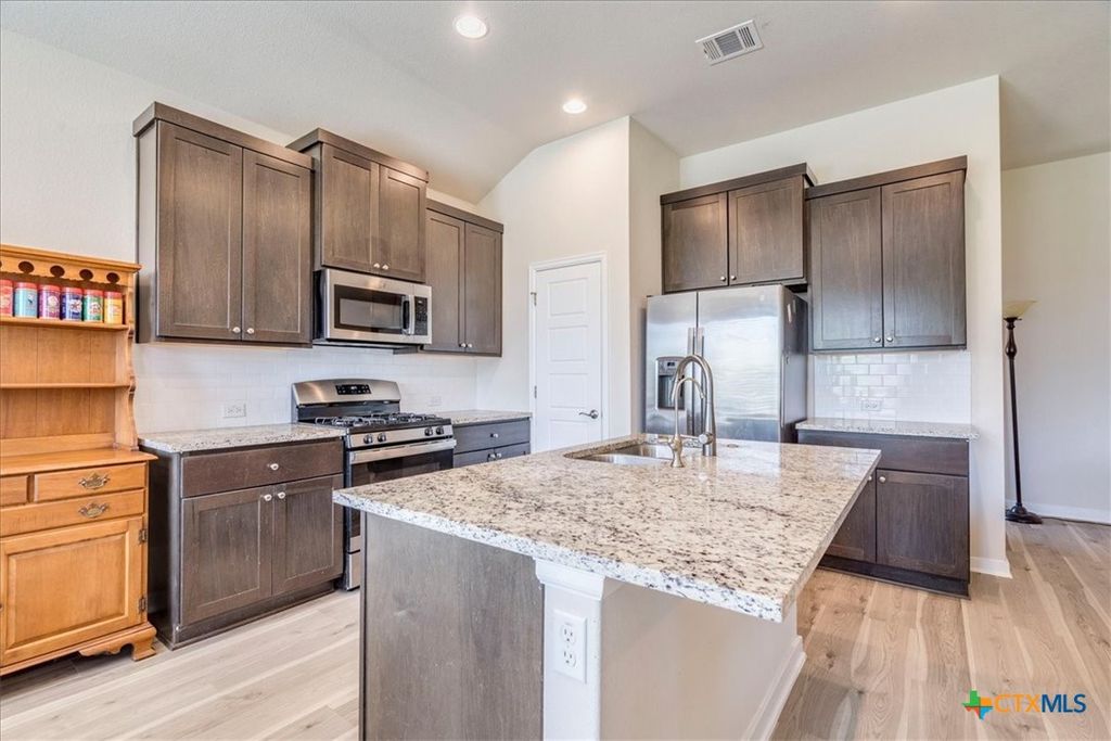 Photo of 712 Coyote Creek Way, Kyle, TX 78640 (MLS # 608857)